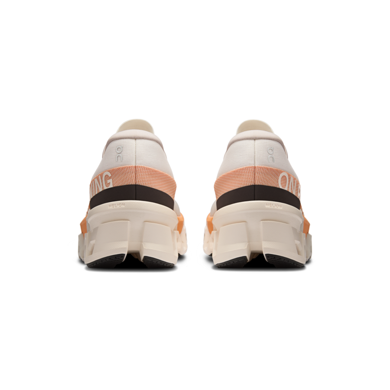 On cloudmonster 2 Ivory/tangerine